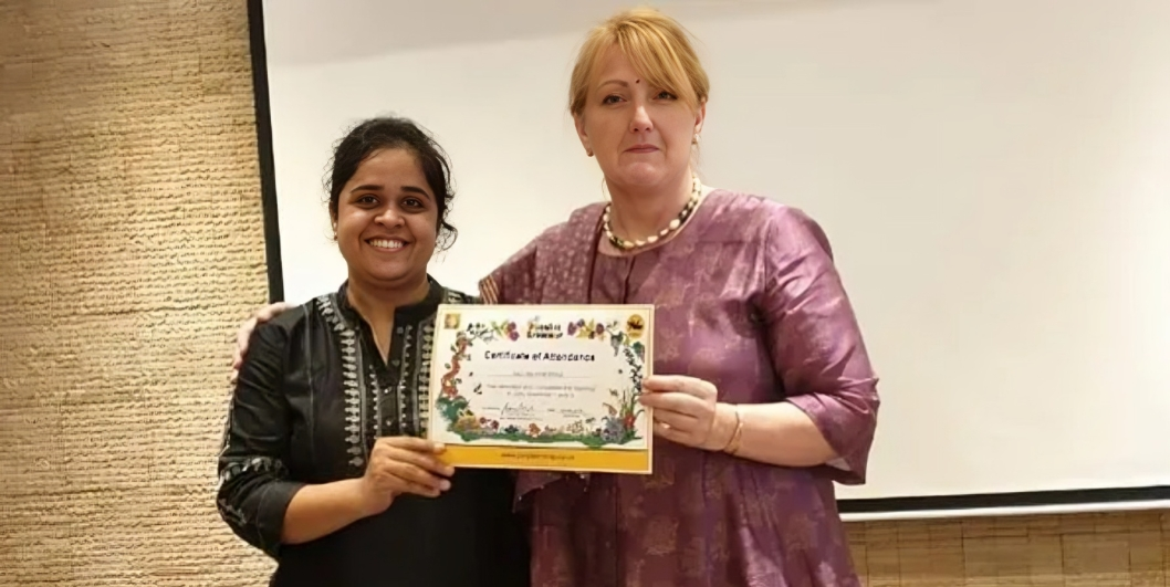 Learners’ Kingdom founder receiving Certificate of Attendance at an international early childhood education seminar.